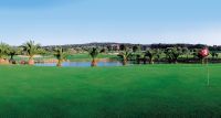 Golf de Poniente, Loch 10 grüne Wiese Palmen See Berge